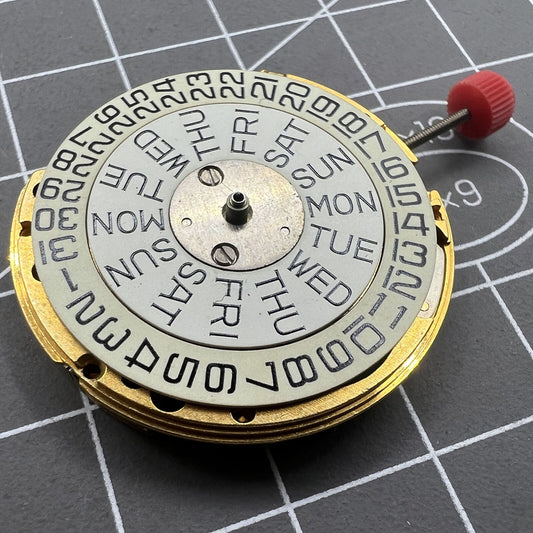 ESA 9183 quartz watch movement with double calendar and 3 hands, precision Swiss engineering.