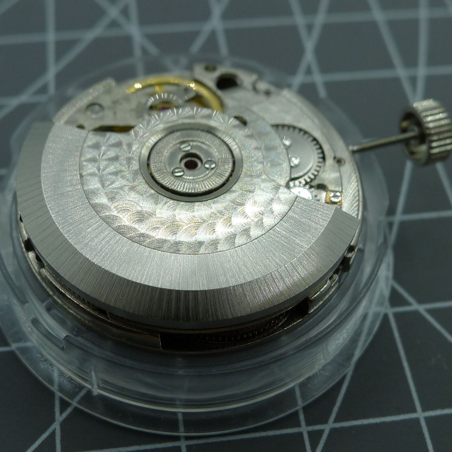 Black Seagull ST2555 automatic watch movement showing 9H second hand, perlage finish, and big date display for precision timekeeping.