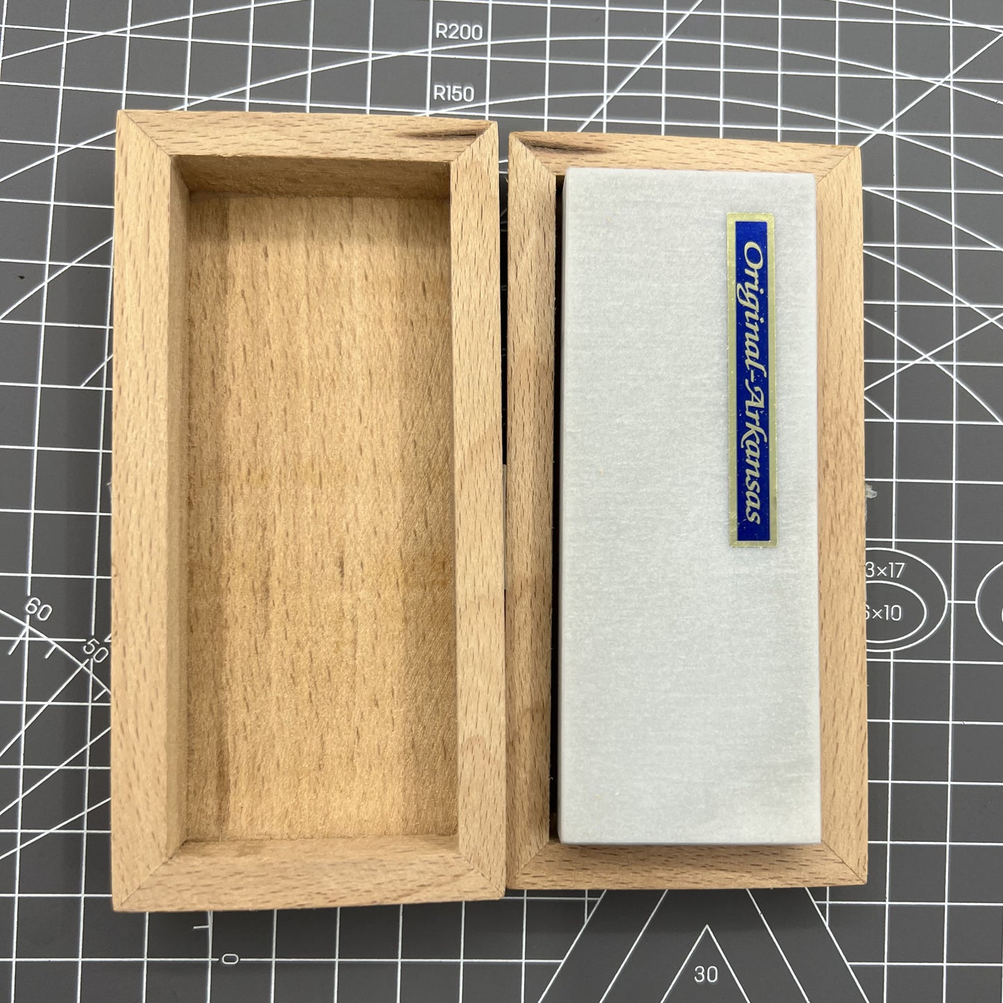 Swiss Tool Horotec MSA16.051 rectangular Arkansas stone in wooden box for precise watch accessory polishing and maintenance.