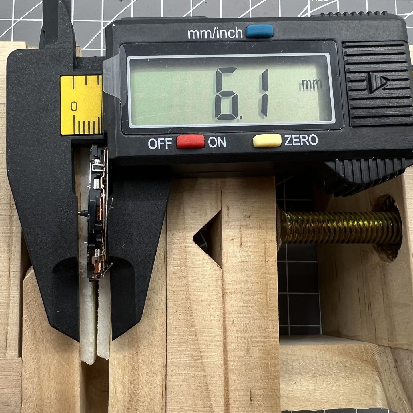 Japan Hattori Epson TMI YM91A quartz watch movement showing date display at 3 o'clock, precision engineered.