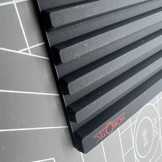 Swiss Horotec MSA24.223 black silicon bench mat with 32 grooves for secure watch accessory handling