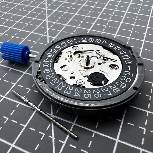 Seiko NH35 watch with black date dial and automatic mechanical movement, crown positioned at 3.8.