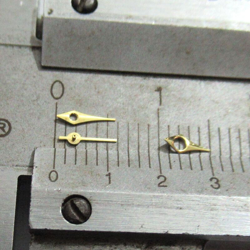 4mm golden pointed watch hands set for Miyota 2035 movement, precise accessory.