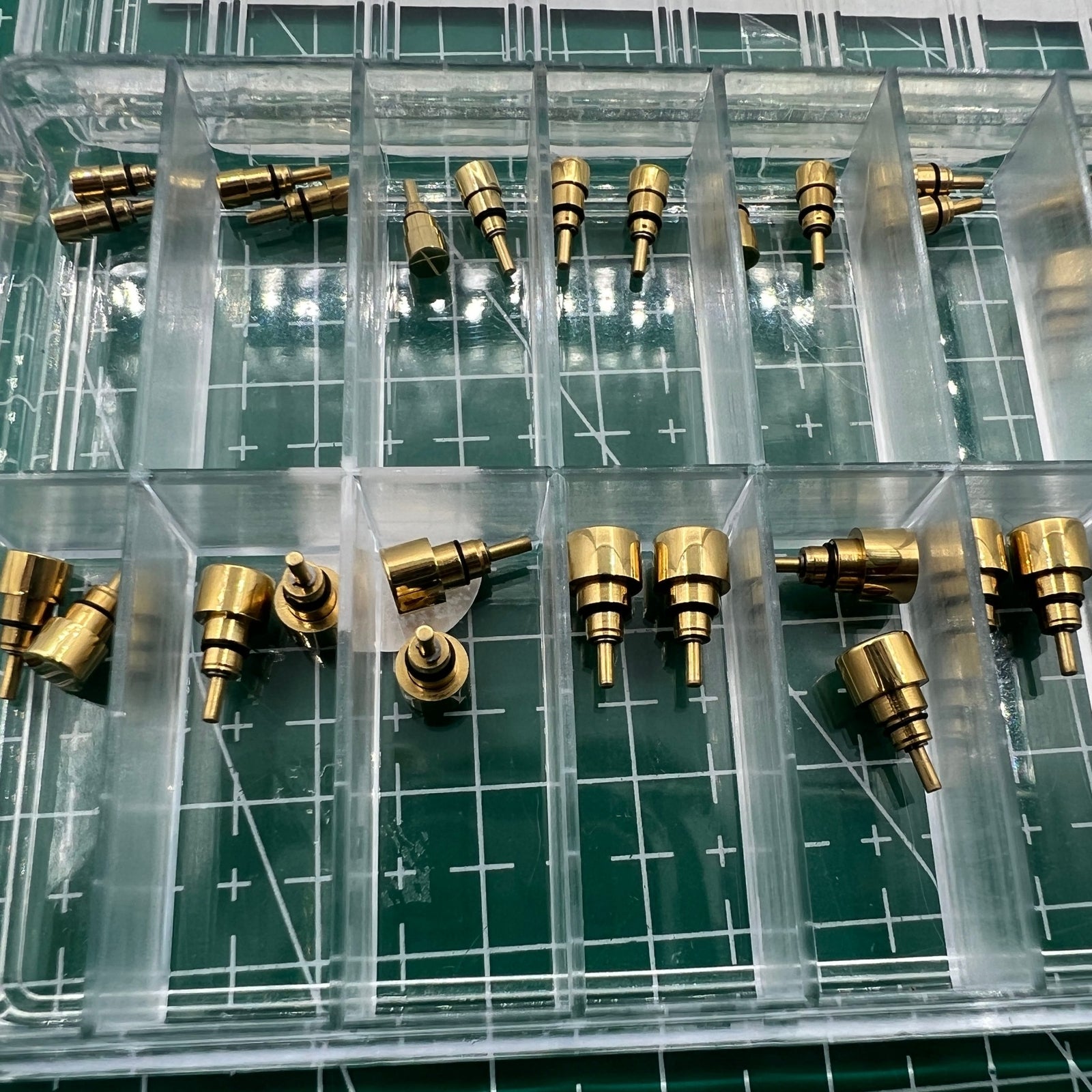 Golden stainless steel watch accessory by Wholesale Watch, classical pusher drive, available in 13 sizes for durable repair.