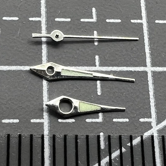 11mm Arrow silver-trimmed green lume watch hands for Miyota 2035, 2115, and 2105 movements.