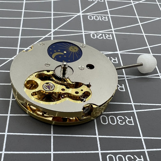 Skeleton dial Generic 8205 mechanical watch with star phase and small seconds at 5 o?clock.