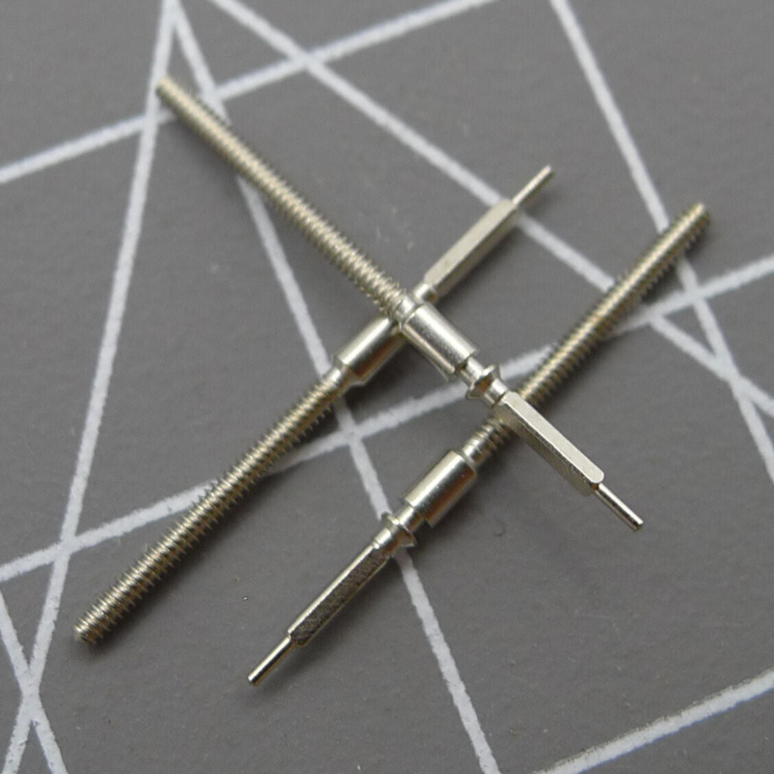 Set of 3 Seagull ST25 winding stems compatible with ST25 2503-2505 movements for watch repairs.