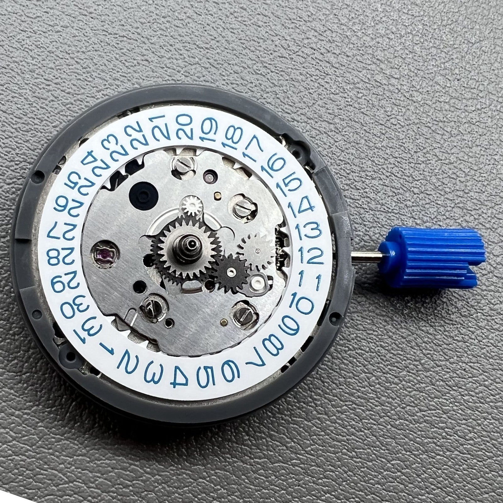 Seiko NH34 automatic GMT watch movement showcasing hacking seconds and precise timekeeping features.