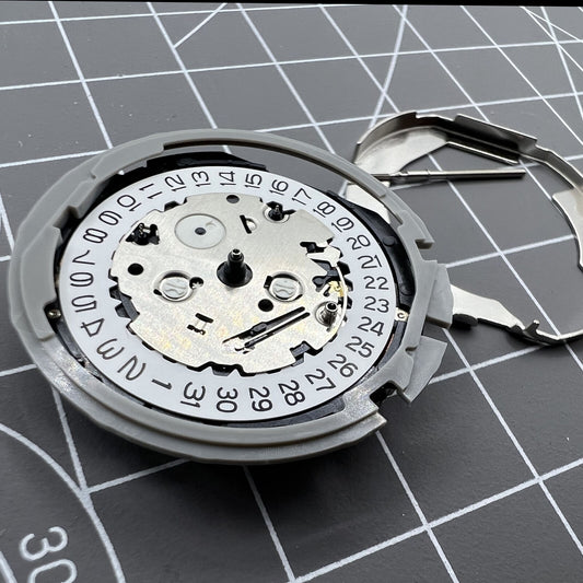 Hattori Epson TMI YM82A quartz watch movement, precision timekeeping by Japan Made.