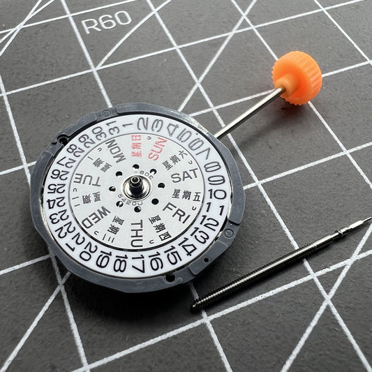 Miyota 1L02 quartz watch movement with English Chinese dial, precise timekeeping accessory.