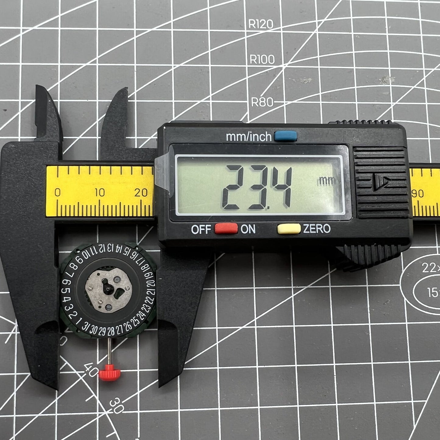Black dial watch with Miyota 2315 quartz, 3 hands, date at 6, featuring watch stem.