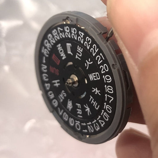 Seiko NH36 black datewheel mechanical watch movement with 3/3.8 O'Clock crown, precision timepiece part.