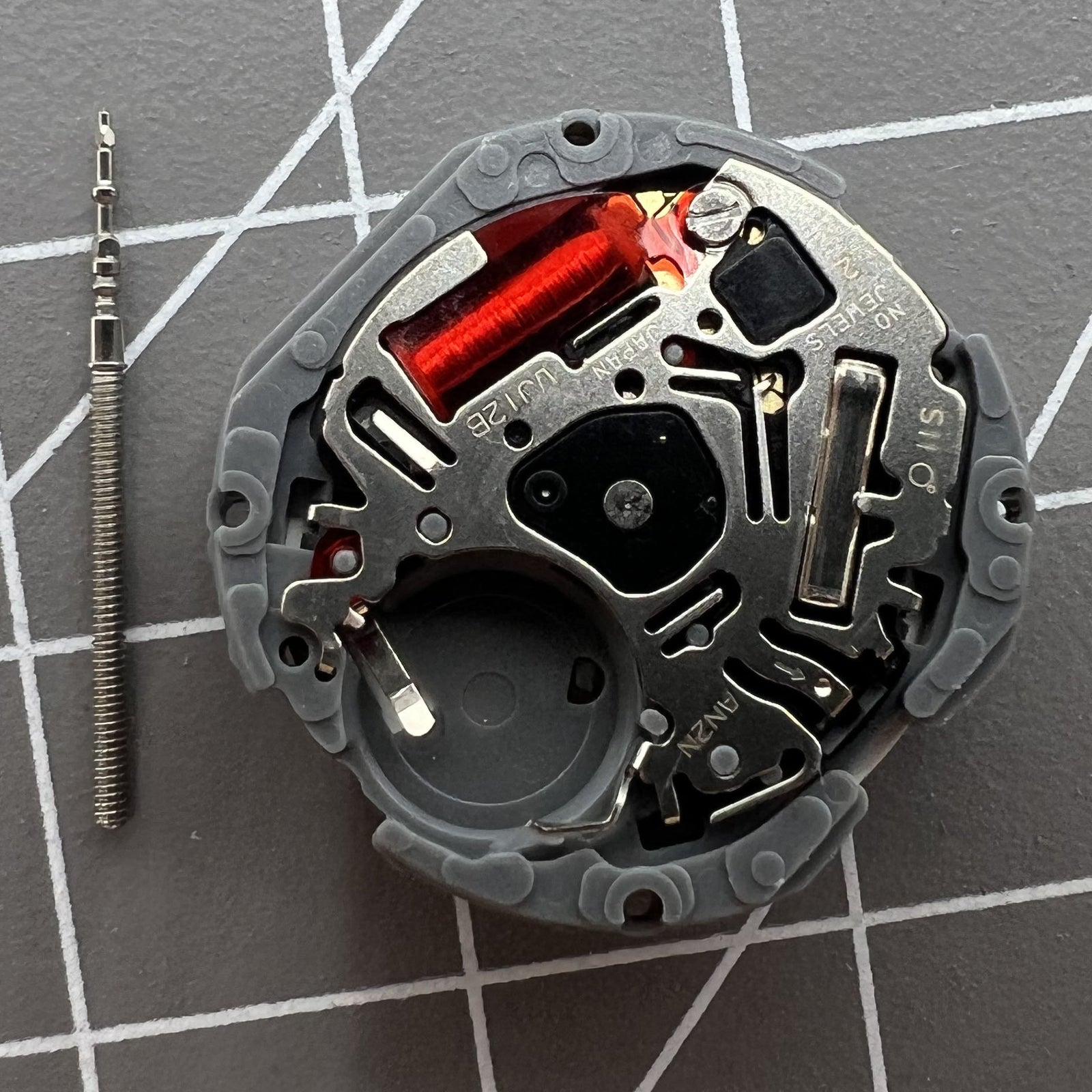 Hattori Epson VJ12B quartz watch movement with date display at 6 o'clock, precision Japanese mechanism