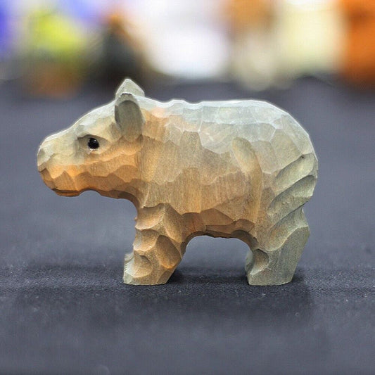 Handmade little hippo wooden sculpture, charming decorative artwork for home decor.