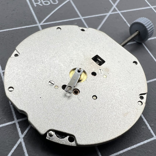 Swiss Ronda 703 quartz watch movement, high-precision timekeeping component for accessories.