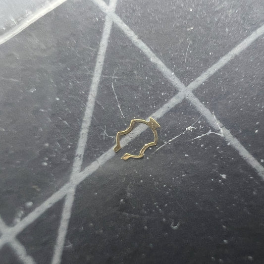 ETA watch movement plate click spring cap jewel close-up for precise repair and assembly.