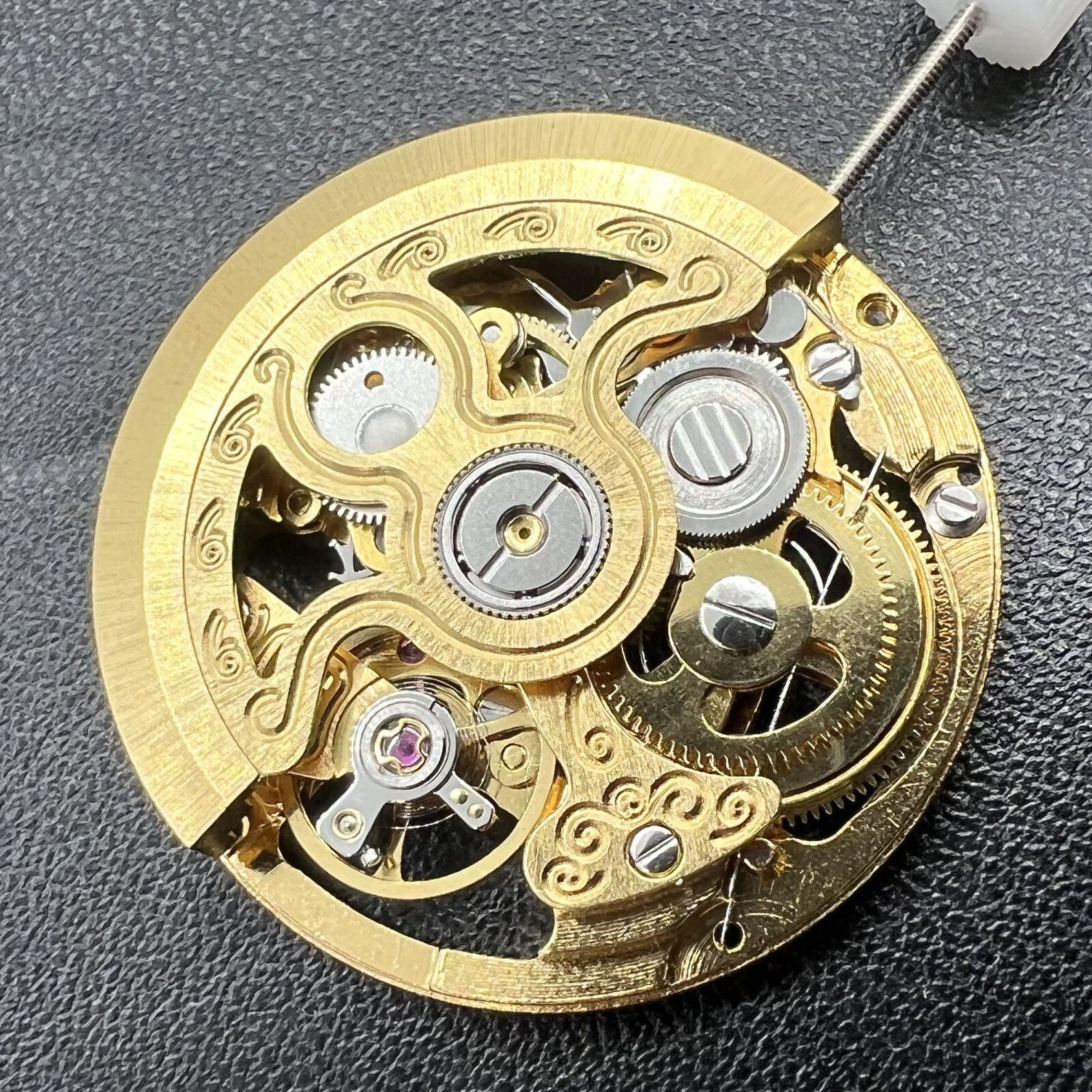 Hangzhou 2189 watch accessory showcasing golden hollow design and automatic mechanical movement for style.