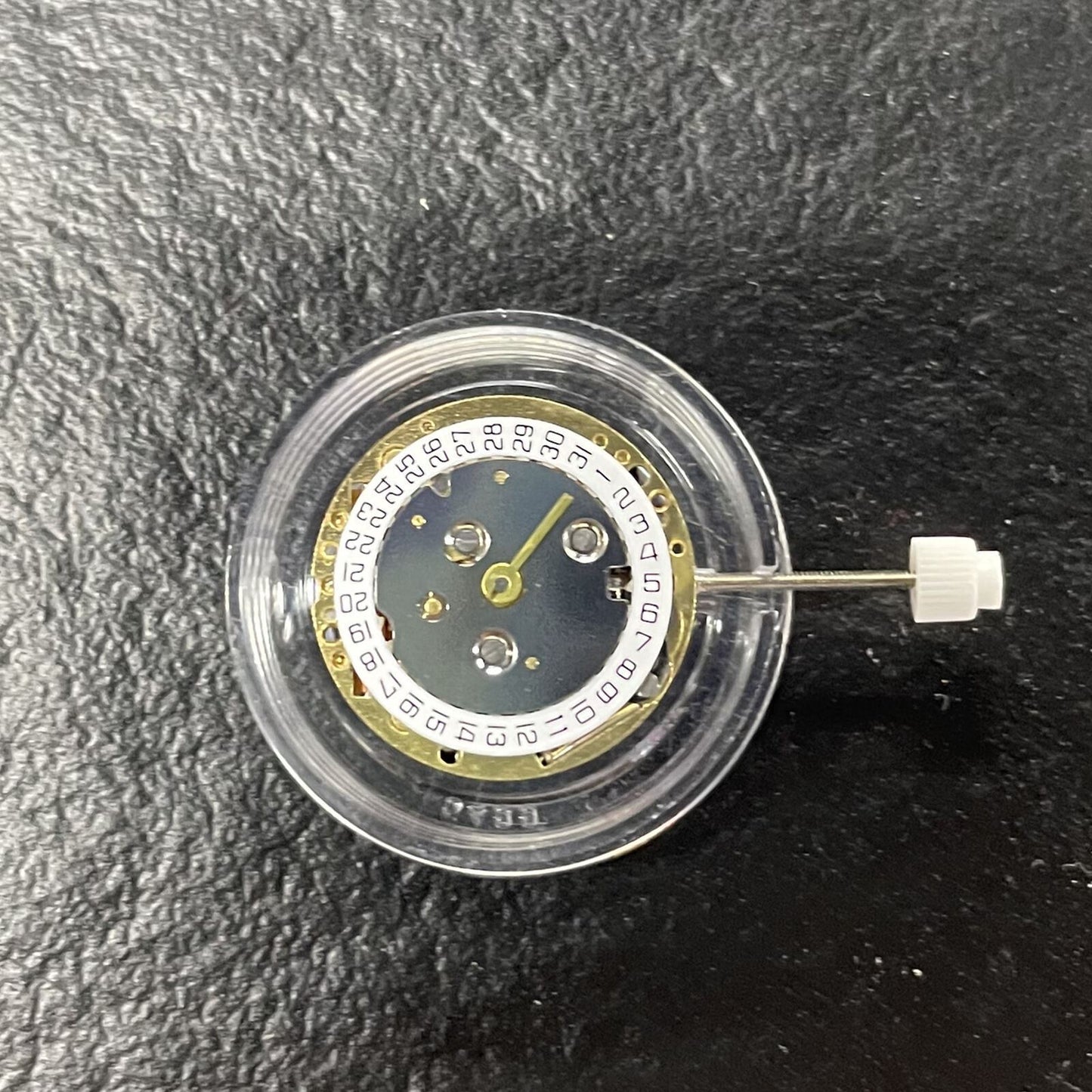 ISA 220 golden quartz movement for lady watch repair by Watchmakers, precise and durable replacement part.