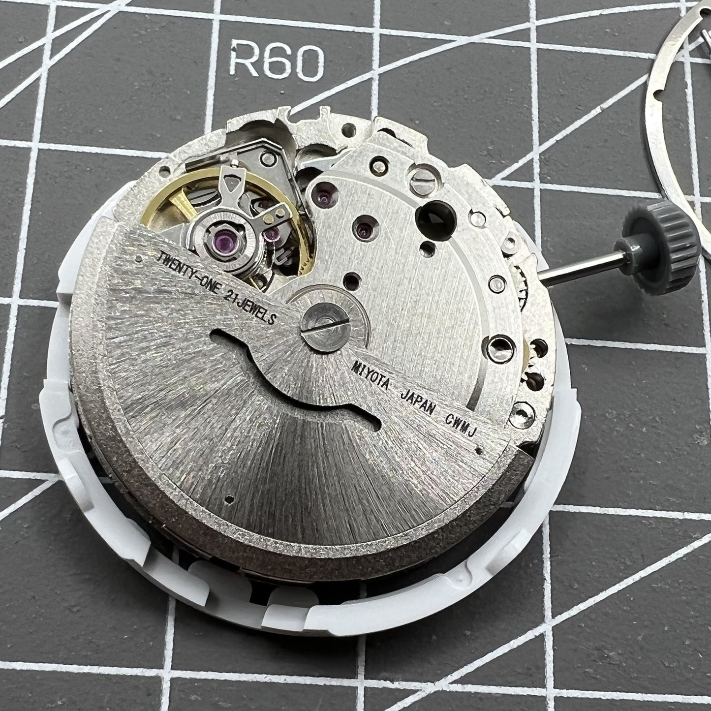 Miyota/Citizen 8215 automatic watch movement featuring black dial with date at 6 for precise timekeeping.
