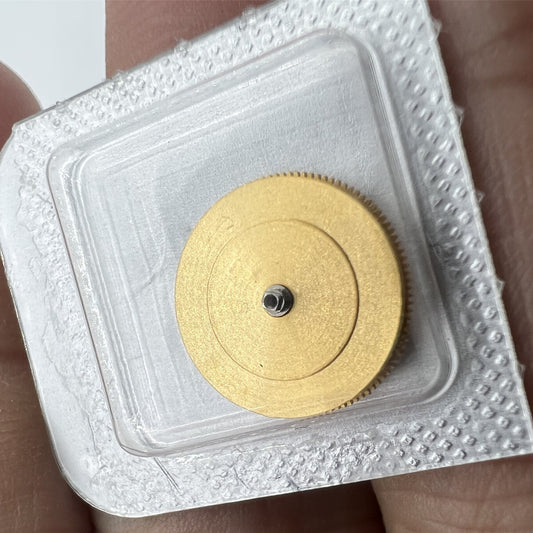 Original Omega 3303/3313 movement barrel with complete mainspring for precise watch performance.