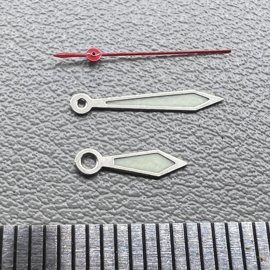 Set of silver-trimmed red second hand and green lume hands for Miyota 1M12 watches.
