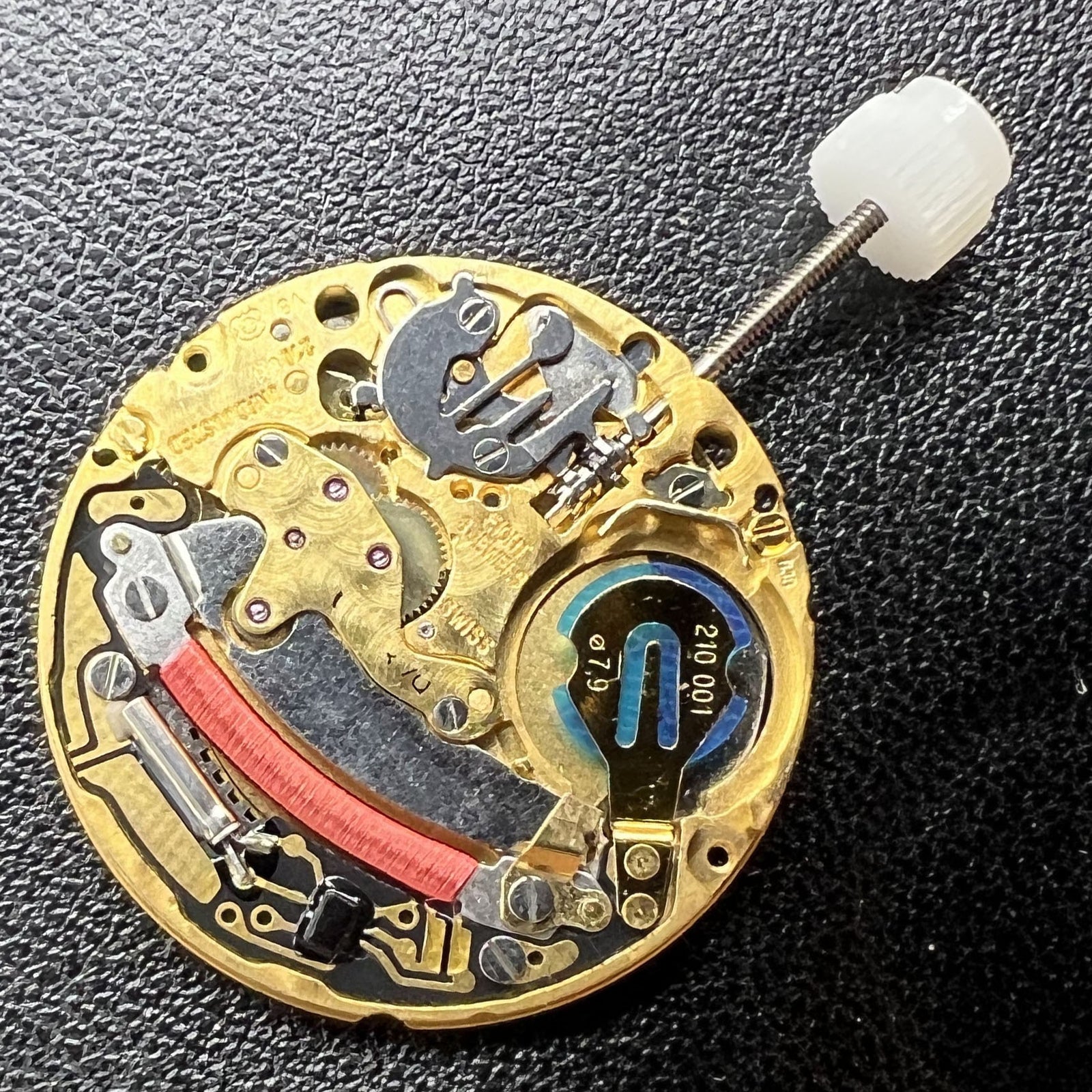 ETA 210.011 Swiss Quartz watch movement with 2 hands, single date calendar for precise timekeeping.