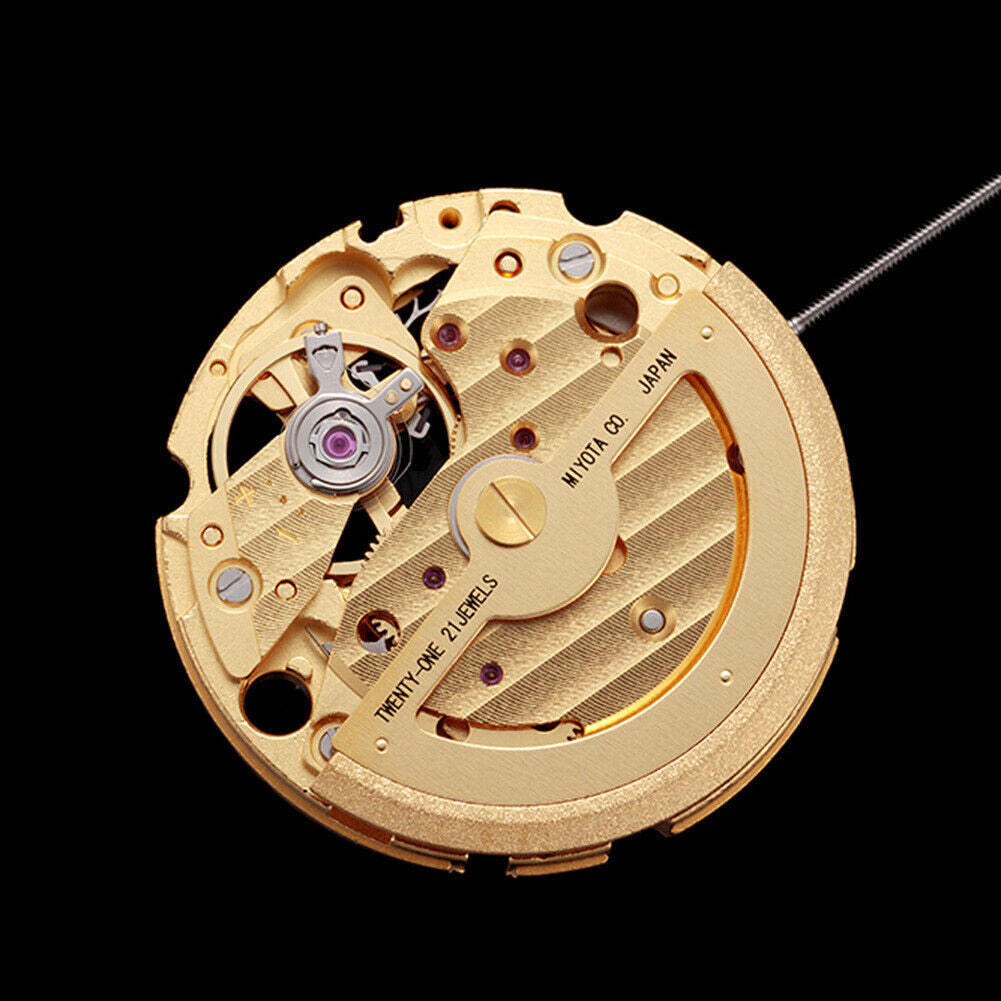 Golden plated Miyota Citizen 82S7 automatic watch movement, precise mechanical timekeeping component.