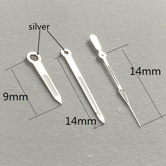 Silver-trimmed 14mm watch hands with green lume, compatible with Ronda 515 quartz, enhancing visibility and style.