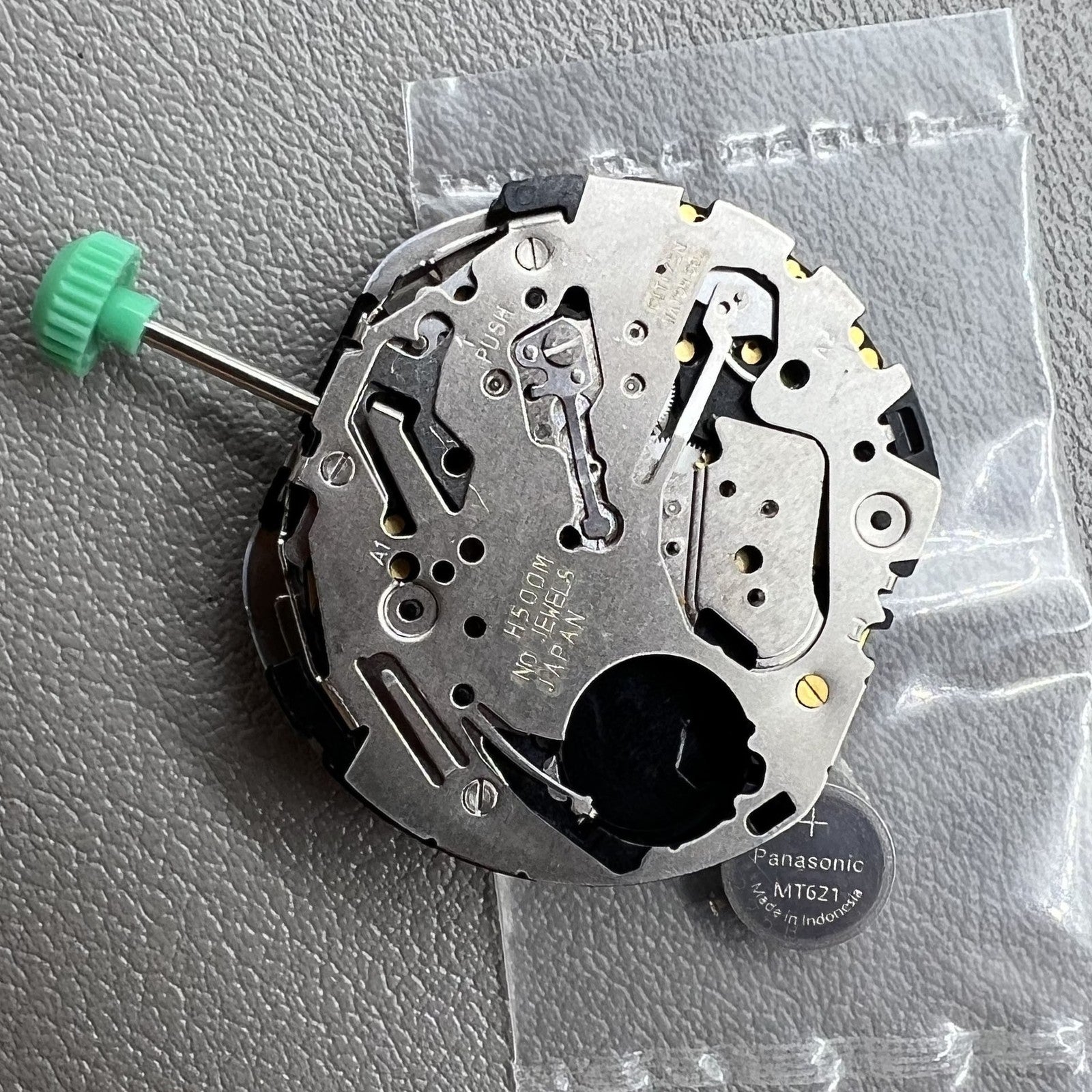 Citizen H500M watch accessory displaying solar quartz Eco-Drive movement with small seconds hand detail.