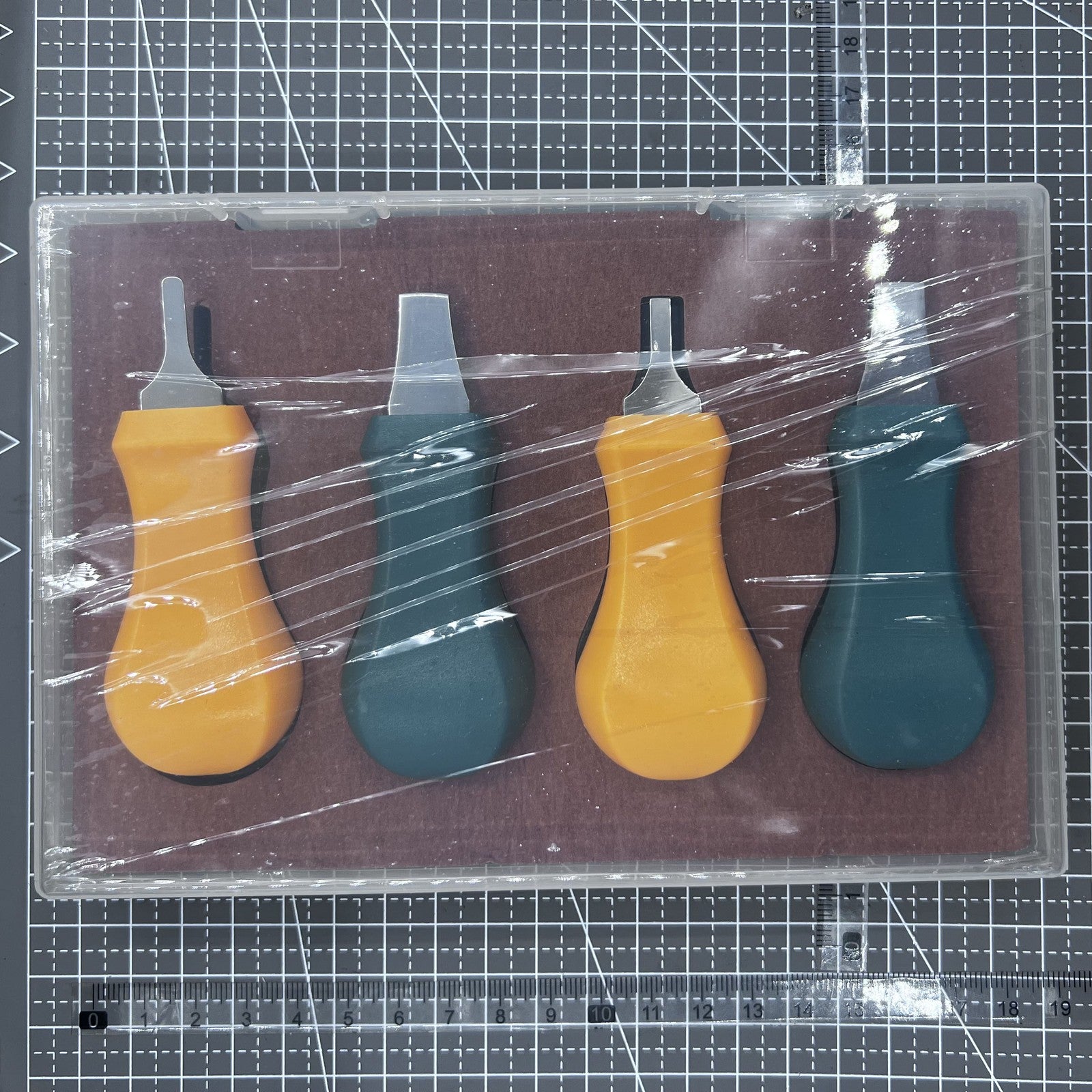 Set of 4 Snap-on Pry Knives for watch back case removal, durable bezel opener tools by Snap-on.