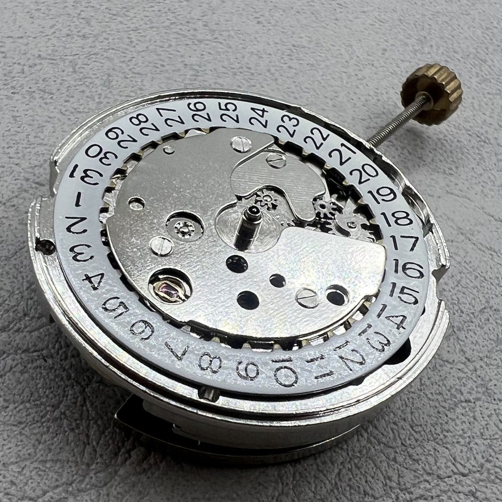 Dandong 7120 watch accessory displaying automatic mechanical movement with single calendar function for classic timekeeping.