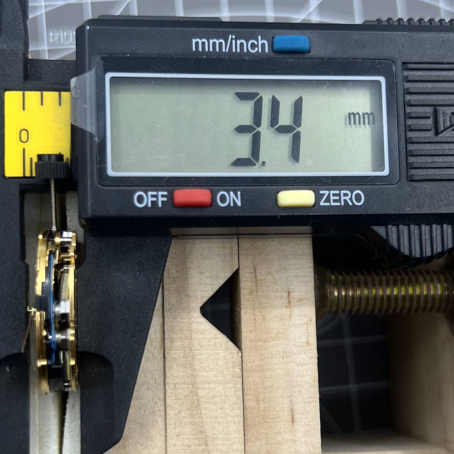 ETA 251.471 multifunctional quartz watch movement close-up displaying precise gear and component details.