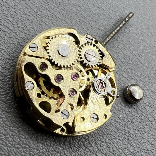 Set of 2 hollow 17.2mm golden mechanical movement cufflink parts for watchmaking.