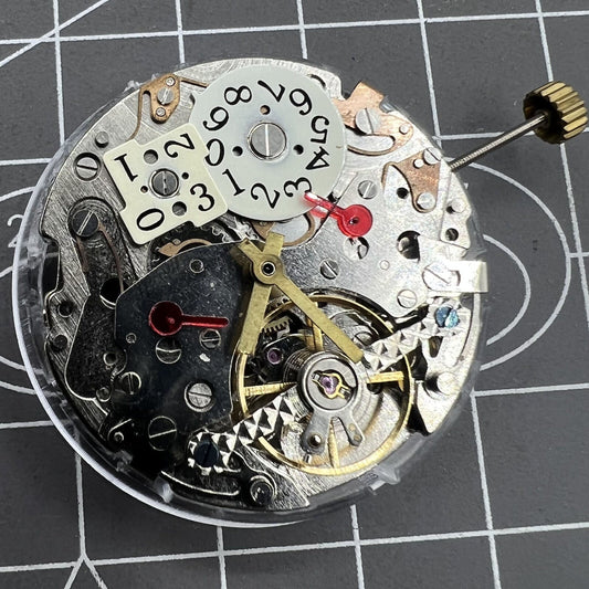 Automatic multifunctional watch with mechanical movement, date at 12 o?clock, bare wheel at 6, branded design.