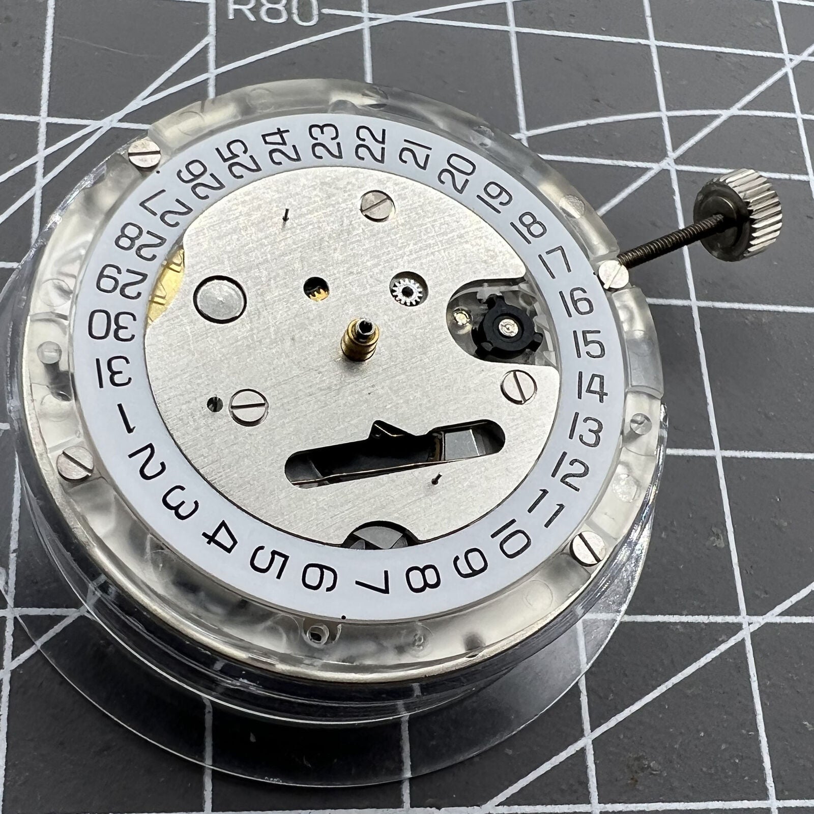 Tissot Genuine ETA C01.211 chronograph watch movement with white dial for precise timekeeping.