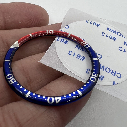 Red and dark blue circular arc aluminum bezel insert for 39mm watch, enhancing style and durability.