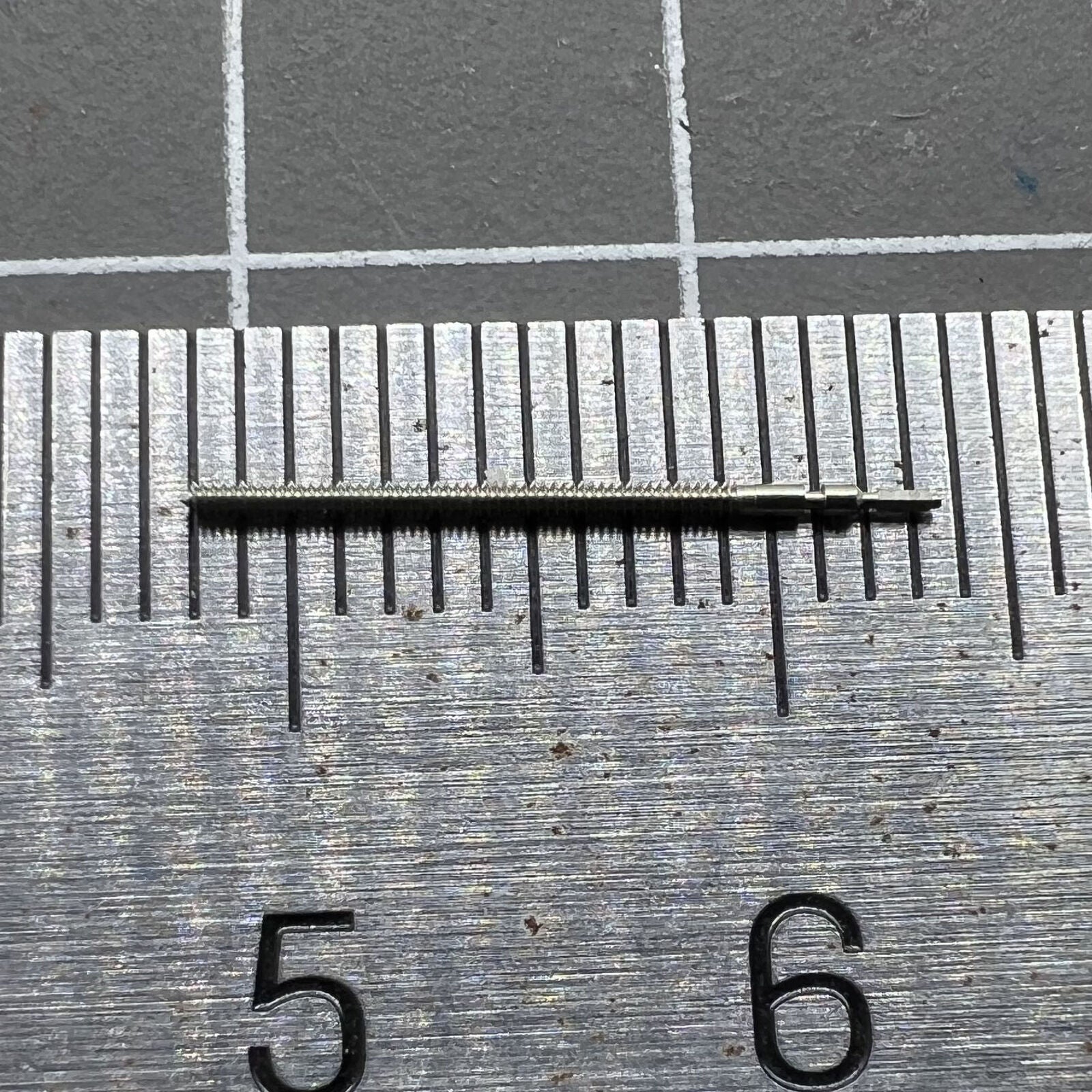 Precision watch winding stem for ETA 282.001 movement, compatible with multiple models, durable Swiss brand component.