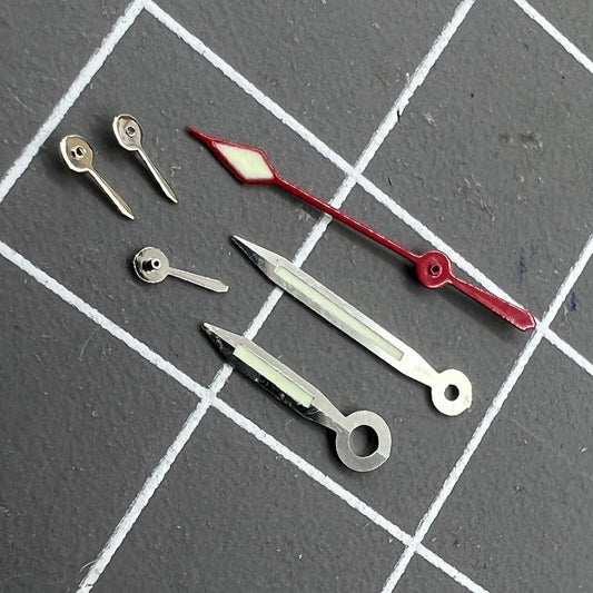 Green luminous 10.5mm silver-trimmed watch hands set for China 7120 movement.