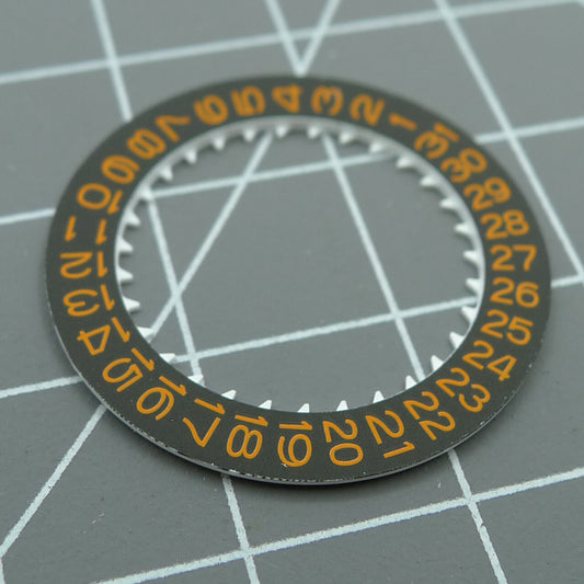 Orange font date disk wheel on black background for NH35 watch movement, enhancing time display accuracy.