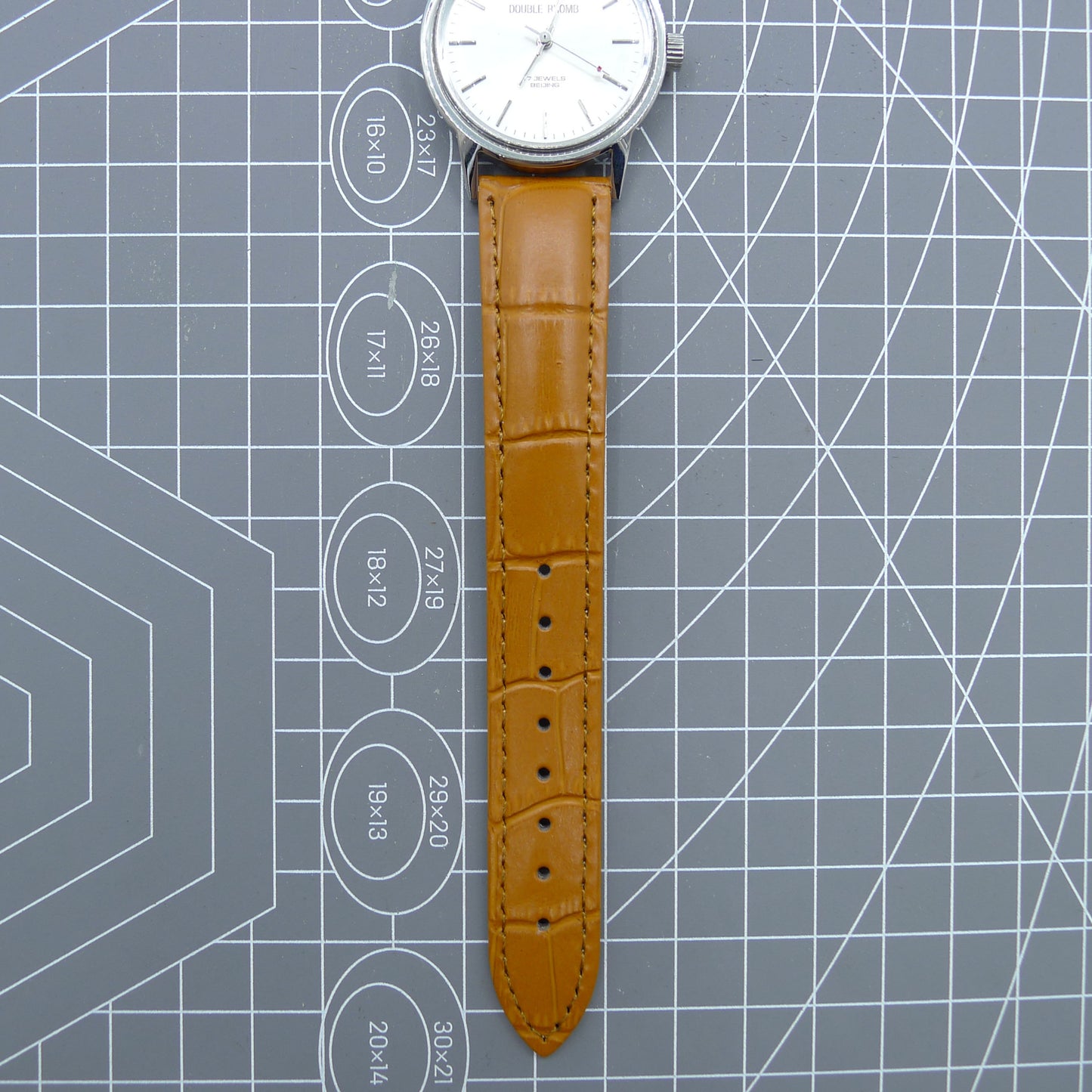 Beijing 36mm Double Rhomb watch with silver case, nail markers, and manual mechanical movement for precise timekeeping.