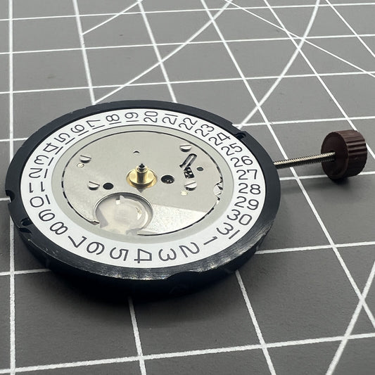Swiss Made Ronda 515 quartz watch movement with date at 3, premium Swiss parts for precise timekeeping.