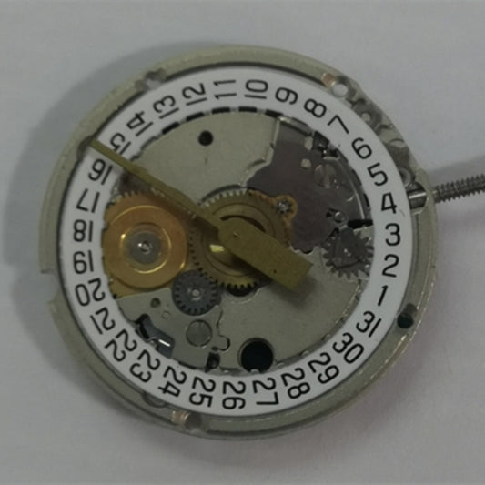ETA 956.114 quartz watch movement replacement with white dial and 3-hand display for precise timekeeping.