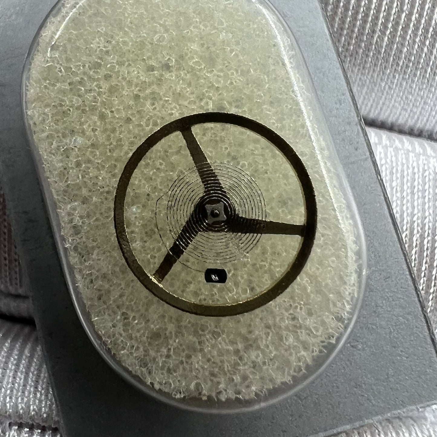 Swiss ETA C01.211 balance wheel #6402, original precision timing part for watch repairs and maintenance.