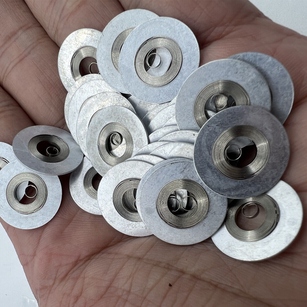 Silver mainspring for Movement 7009#180, compatible with various watches, high-quality generic fit.