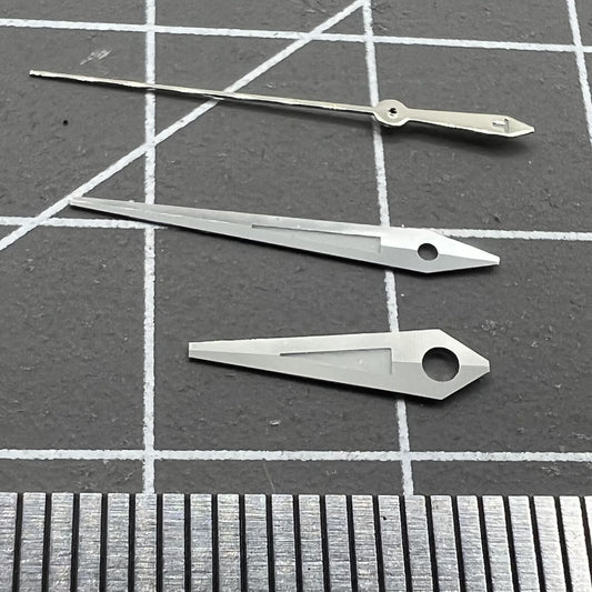 Silver-trimmed green lume watch hands for ETA2834 movement, perfect replacement for T035.