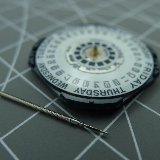 Japan Made Hattori Epson VX44E white dial quartz watch movement by TMI, precise timekeeping accessory.