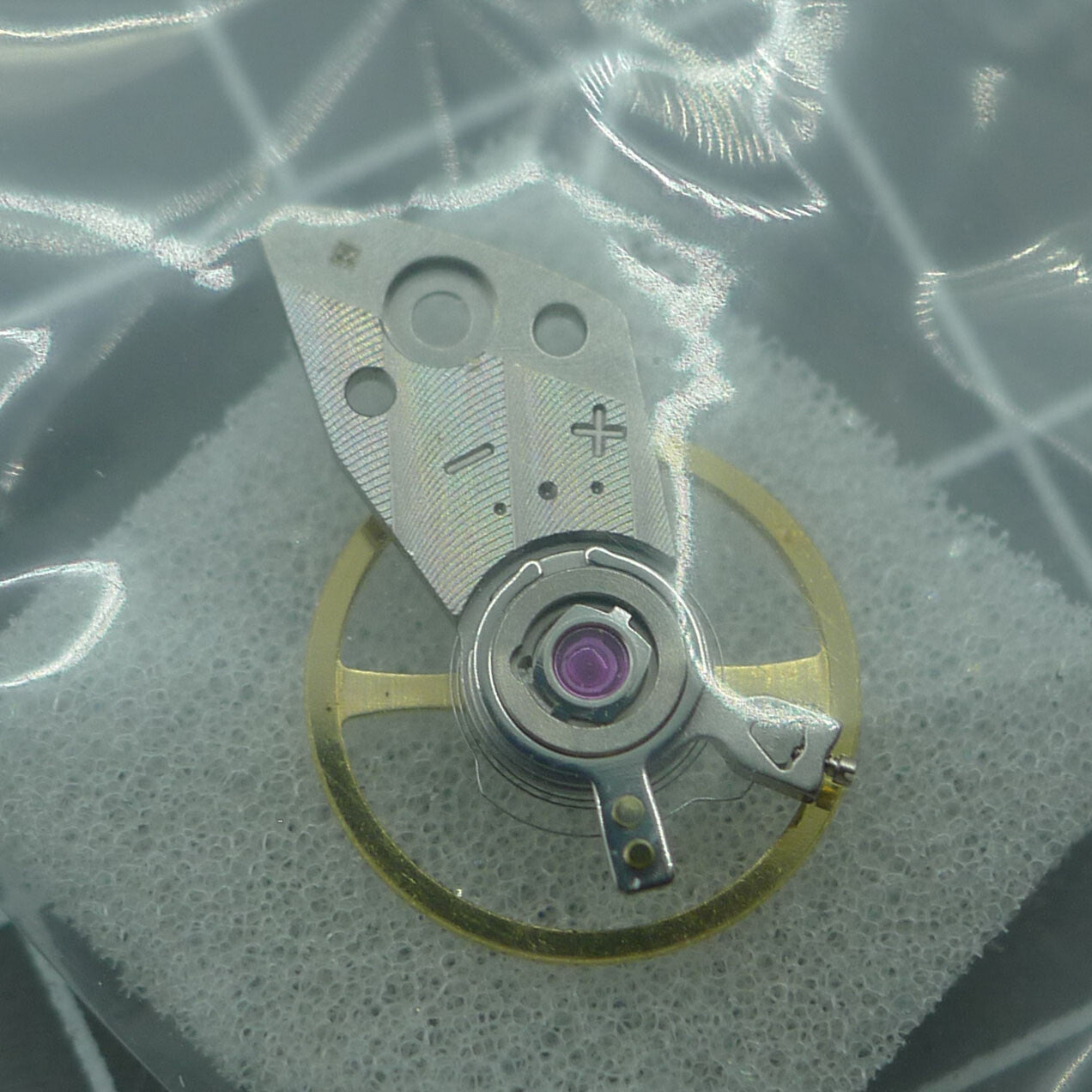 Silver complete balance wheel with splint for Miyota 82S7 watch movement, precision fit by Japan brand.