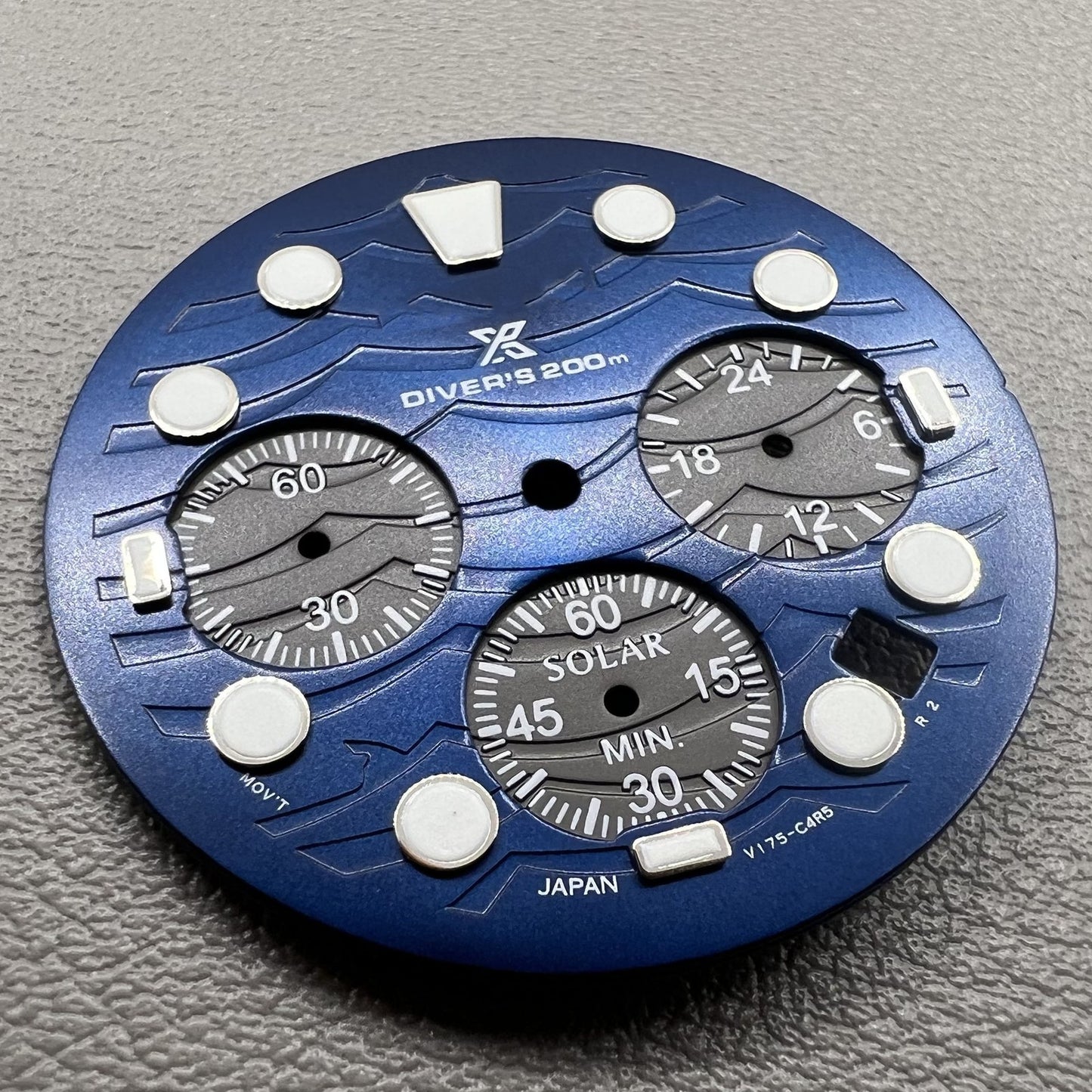 Green luminous watch dial with 31mm silver trim for VD53 movement, perfect for watch repairs.