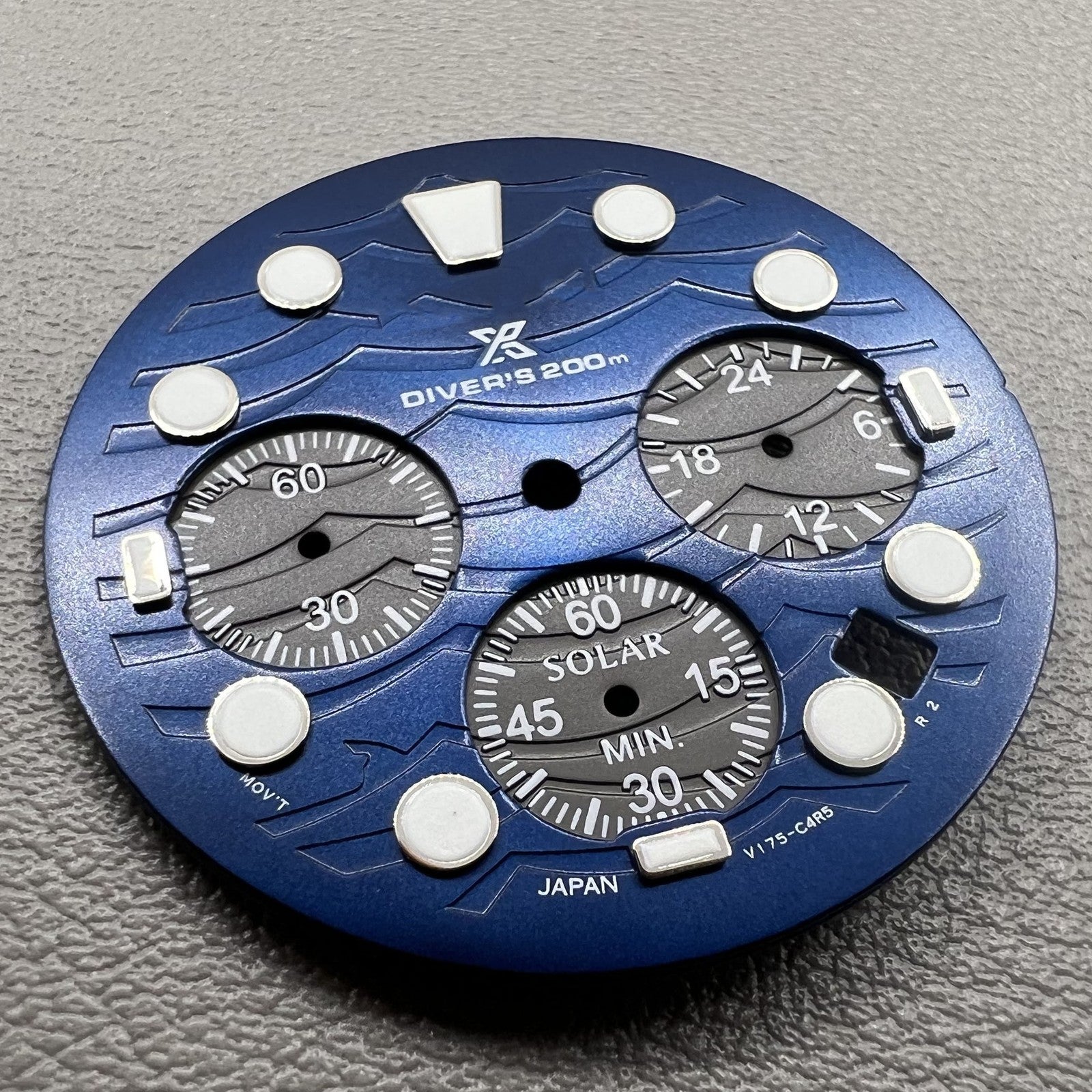 Green luminous watch dial with 31mm silver trim for VD53 movement, perfect for watch repairs.