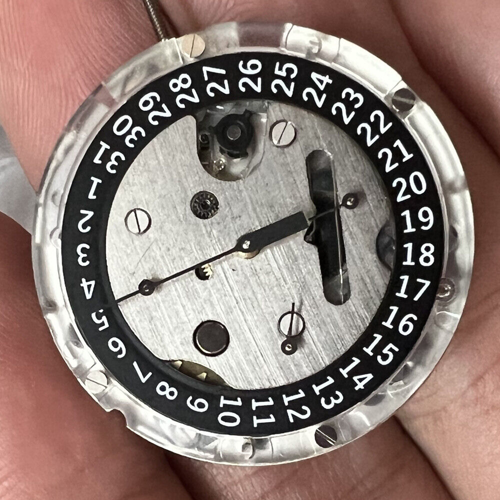 Swiss Made ETA C01.211 chronograph watch movement with black dial, mechanical precision by Tissot 1853.